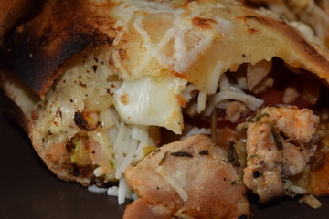 Delicious chicken sandwitch with french fries and sauce.