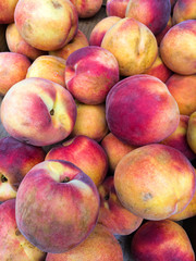 Fresh Organic Peaches Heap at the farmers Market