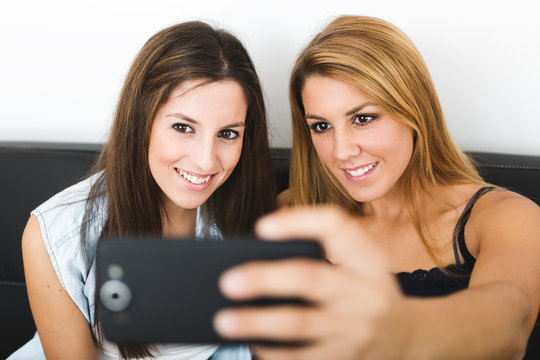 Two young women taking a self portrait