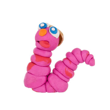 Earthworm from plasticine isolated on white background