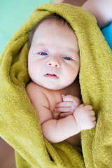Little beautiful blue-eyed baby boy/girl