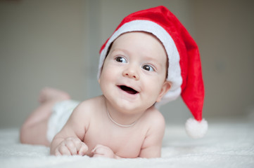 christmas cute baby boy/girl in Santa's hat
