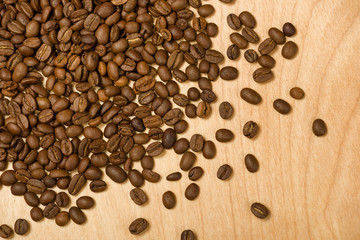 coffee seeds on wooden background