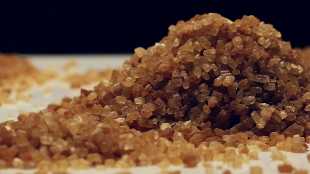Brown sugar from sugar cane,rotating