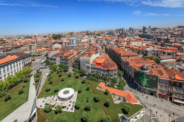 Fototapeta na wymiar Overview of Rooftops and Douro River in Porto