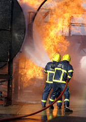 fire fighter at large chemical fire