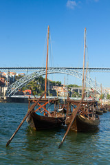 two rabelo boats and bridge of Dom Luis , Portugal