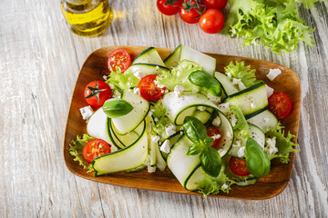 Zucchini salad with tomatoes and cheese