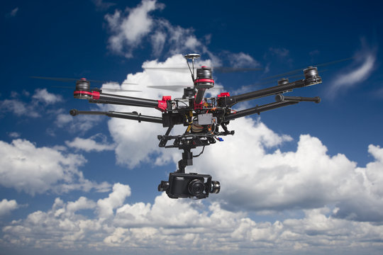 Drone flying in the clouds