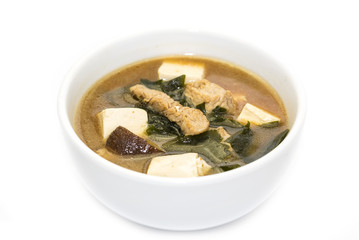 Japanese soup with mushrooms and beef on white background