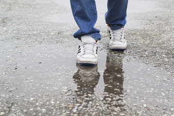 Feet walking in water