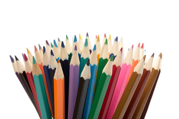A bunch of color pencils pointing up.