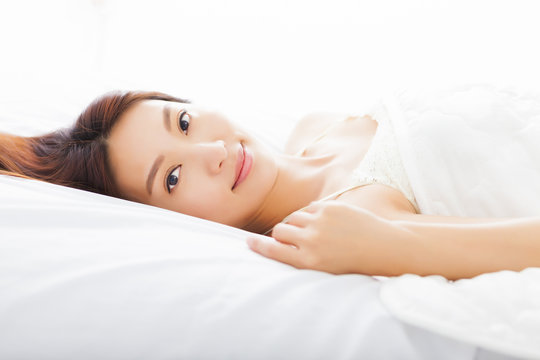 beautiful young  asian woman sleeping in the bed
