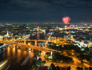 Night Scene Chao Phraya river with fireworks, Bangkok, Thailand