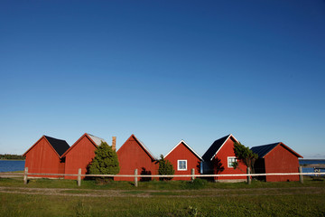 Obraz premium Rote Fischerhütten