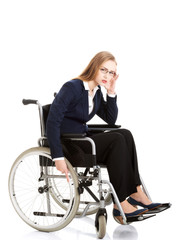 Tired businesswoman on a wheelchair