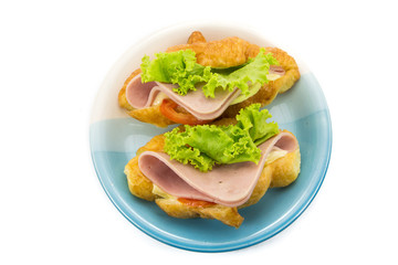 croissant ham cheese on white background