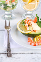 Tasty salad with shrimps and avocado