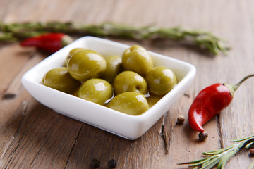 Marinated olives on table close-up