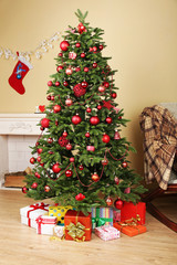 Decorated Christmas tree in room closeup