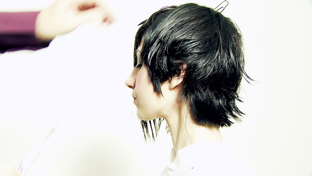 Female model getting short pixie haircut