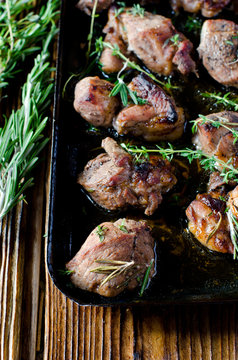 Pork roasted with thyme and rosemary