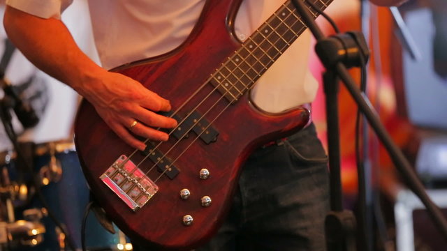 Man Playing Guitar at Concert. Close-up