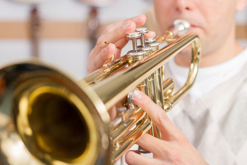 Fototapeta na wymiar Musician playing a trumpet