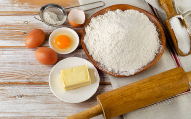 Baking ingredients  on a wooden background