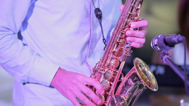 Musician Playing Saxophone. Close-up