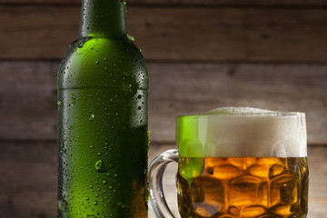 Beer on a wooden background with copy space