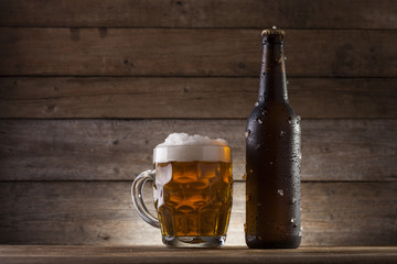 Beer on a wooden background with copy space