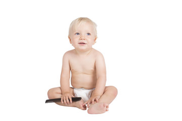 Young boy with black comb