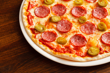 pizza on wood background