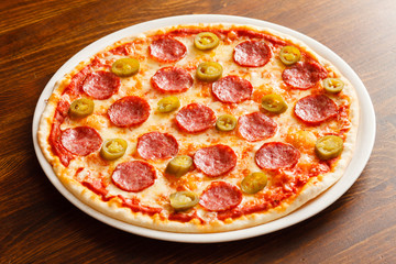 pizza on wood background