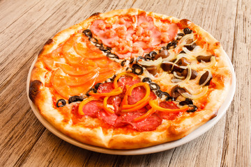 pizza on wooden background