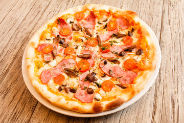 pizza on wooden background