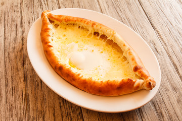 Ajarian khachapuri (Georgian cheese pastry)