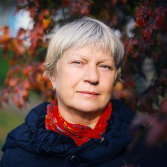 Portrait of a middle-aged woman. Color toned image.
