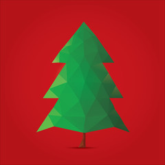 Christmas tree isolated on a red backgrounds.