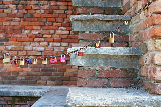 Locks of lovers on chain in romantic place