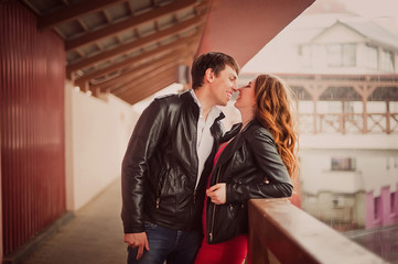 Loving couple embraces and laughs merrily Valentine's Day