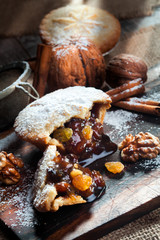 Christmas tarts with cinnamon, walnuts and raisins