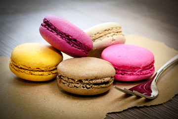 Sweet Tasty Macaroons on Wooden Background