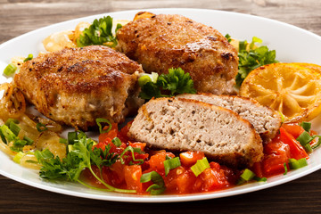 Fried chops and vegetable salad