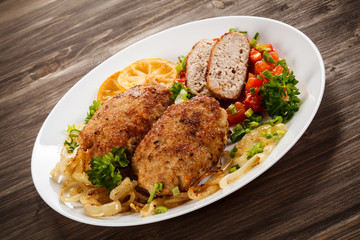 Fried chops and vegetable salad