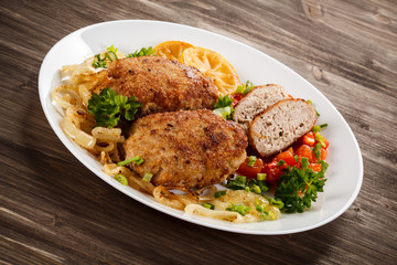 Fried chops and vegetable salad