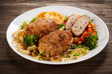 Fried chops and vegetable salad