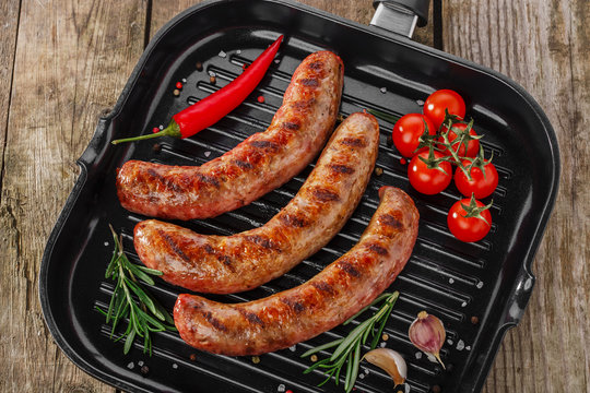 grilled sausages in a pan