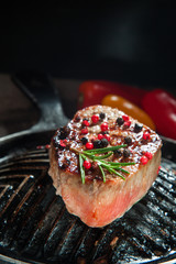 Grilled bbq steak on iron grill pan